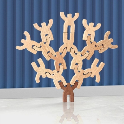 Zaokrąglone drewniane puzzle w kształcie zabawki, aby poprawić charakter logiczny