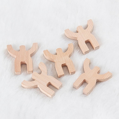 Zaokrąglone drewniane puzzle w kształcie zabawki, aby poprawić charakter logiczny
